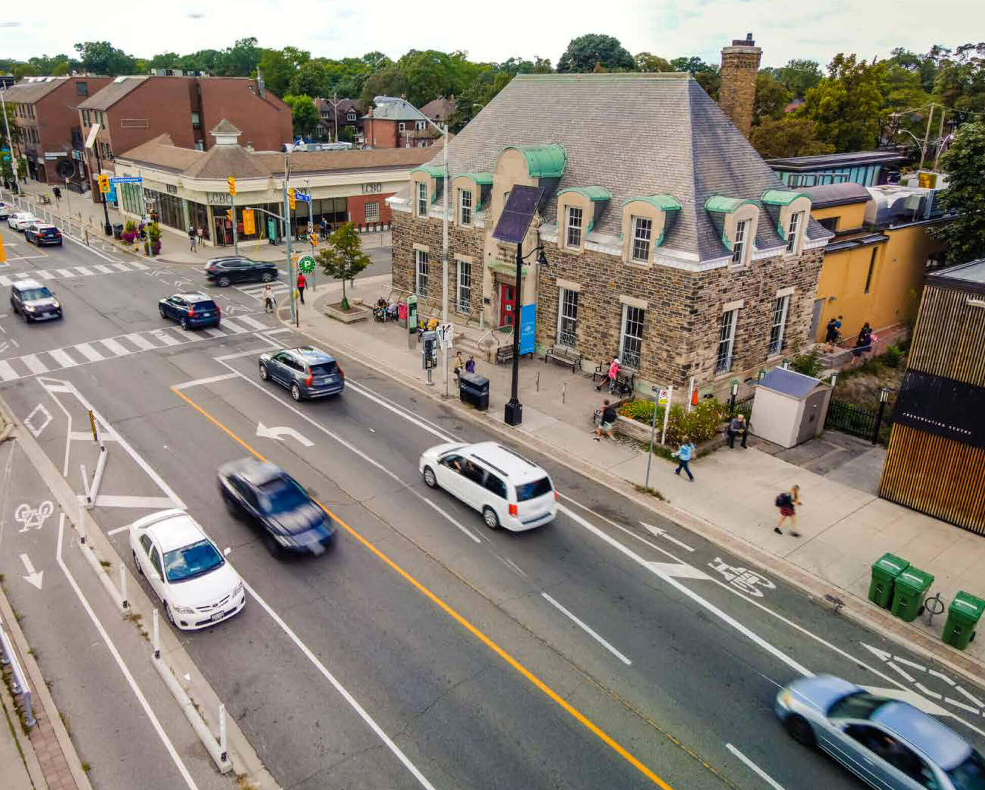 Aerial view of bustling streetscape at Bloor Street West and Glendonwynne Road.