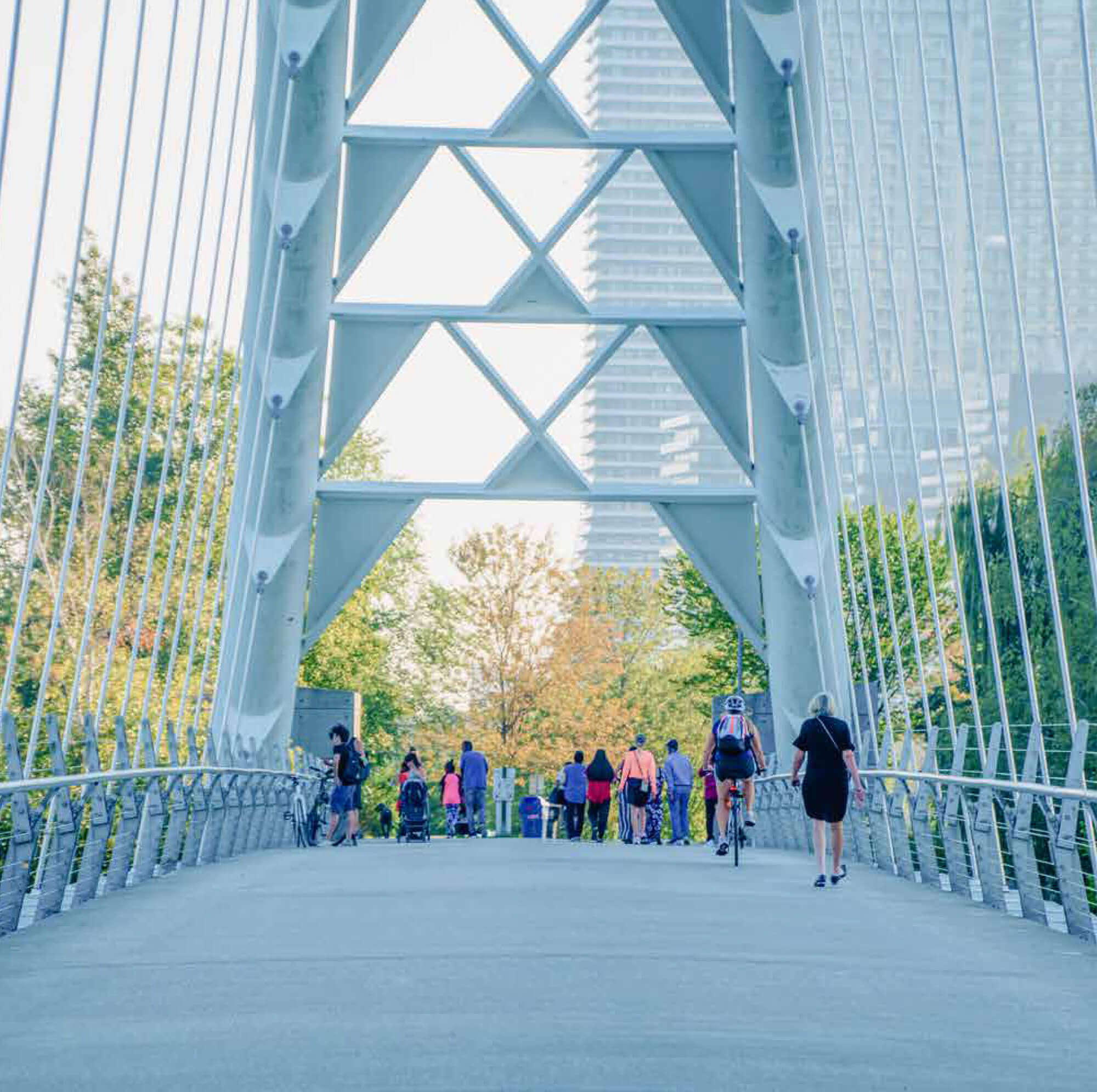 Close-up of the Humber Arch Bridge, Toronto ON, as families cross over.